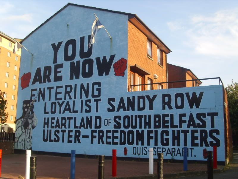 IMAGE: http://i134.photobucket.com/albums/q84/coolershaka/Belfast%20June%202009%20-%20Murals/SandyRow.jpg