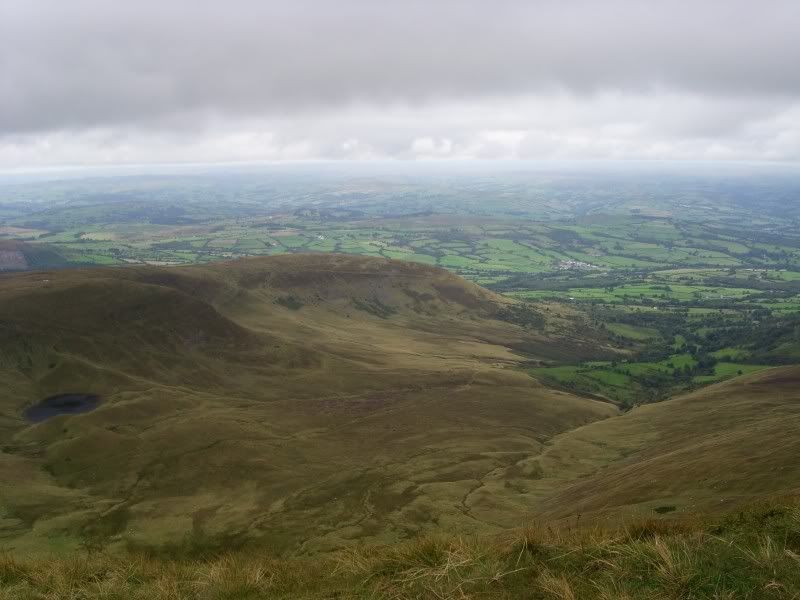 IMAGE: http://i134.photobucket.com/albums/q84/coolershaka/Brecon%20Beacons%20Sep%201st%202007/Powys_from_CornDu-reduced.jpg