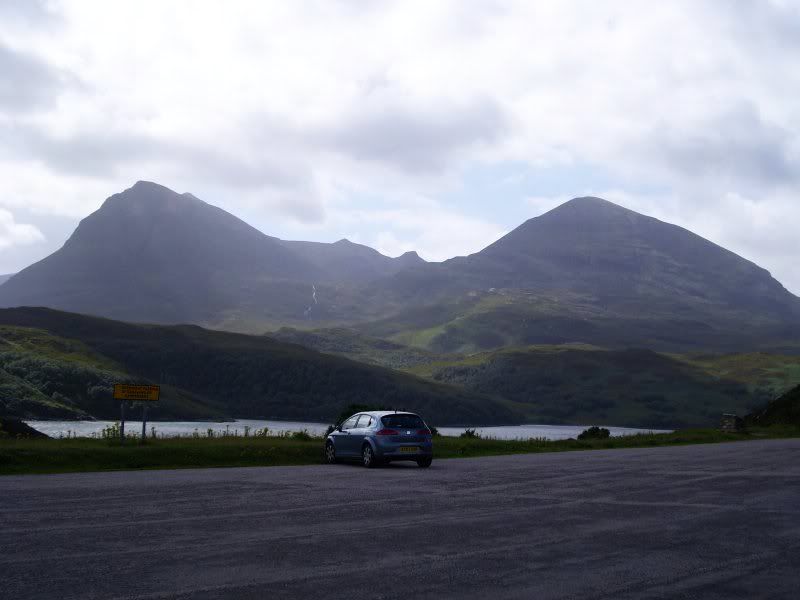 IMAGE: http://i134.photobucket.com/albums/q84/coolershaka/Scottish%20Highlands%20August%202007/QuinagFromKylescuCarPark-red.jpg